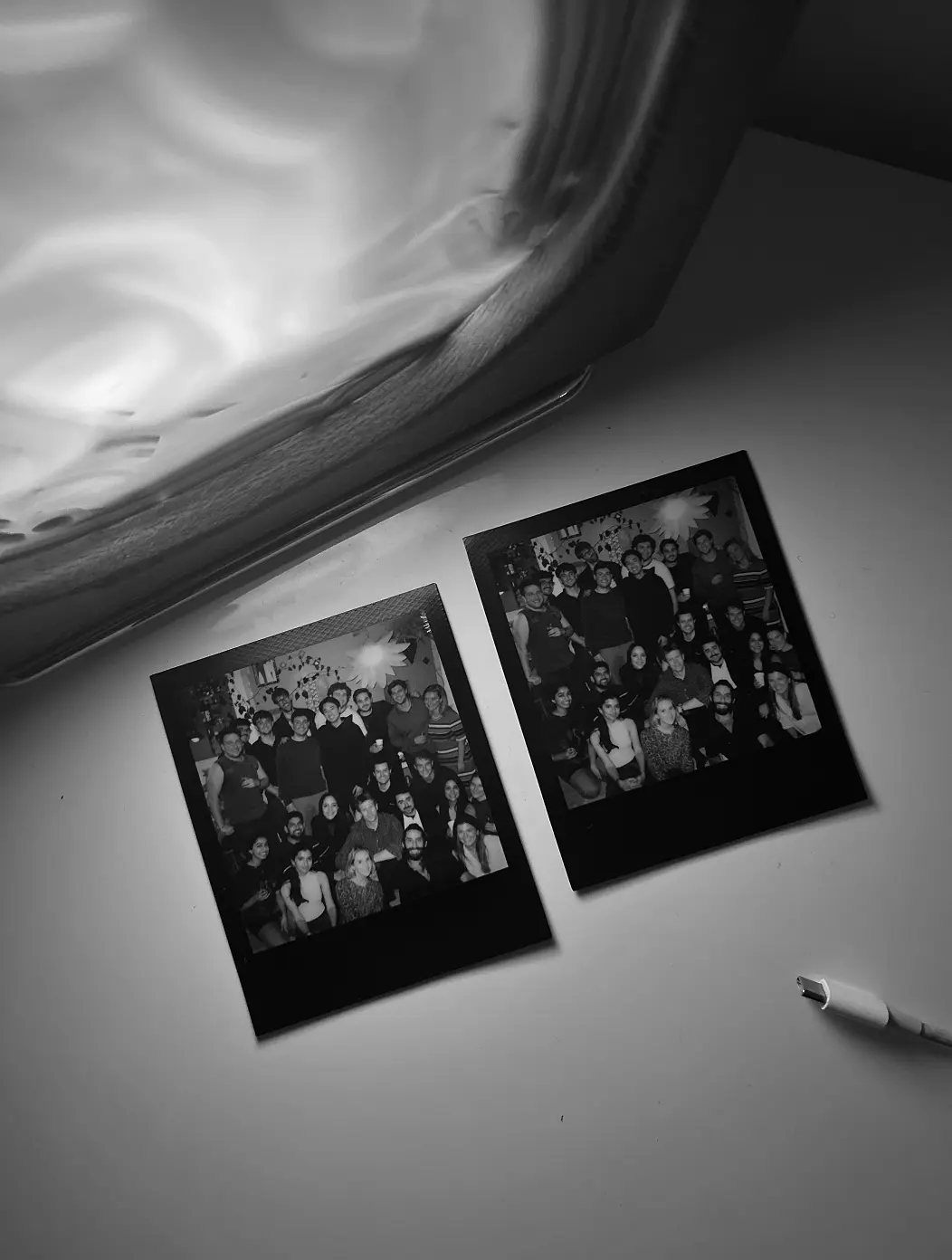 Two printed group photos from a Profound team gathering