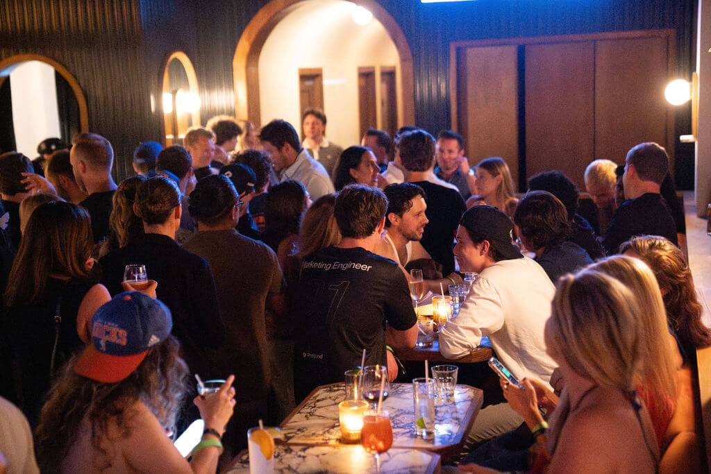 Two attendees wearing name badges at a Profound meetup