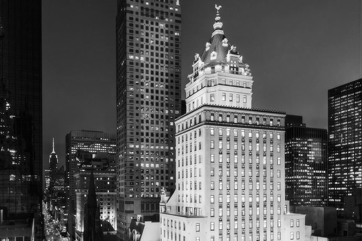 Black and white exterior of Aman New York at the Crown Building